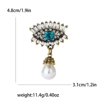 Broche Ojo del Diablo – Esmalte Vintage Estilo Palace | Pendientes y Anillos Unisex